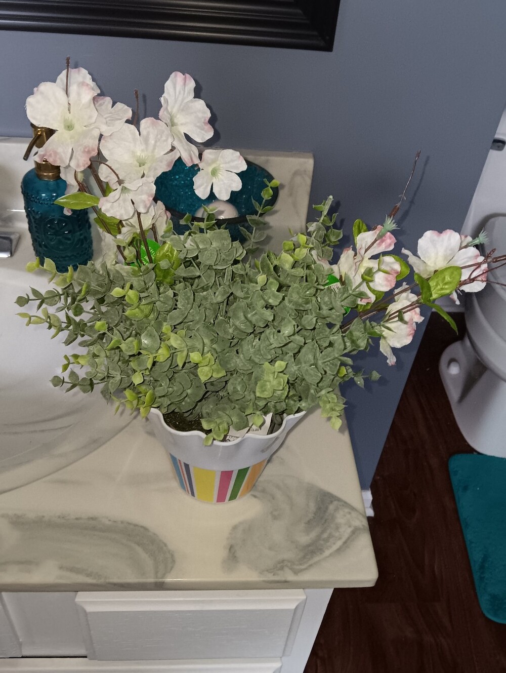 White and Pink Faux Floral and Eucalyptus Arrangement in Striped Pot